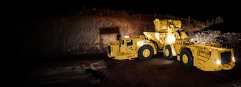 Mining Loaders And Trucks Working Underground 